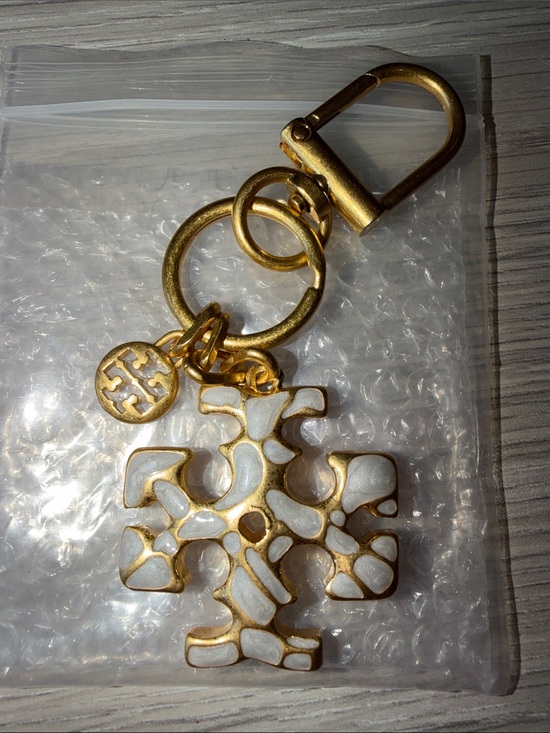Tory Burch Accessories - Tory Burch Gold-Tone Keychain with White Enamel Logo Charm